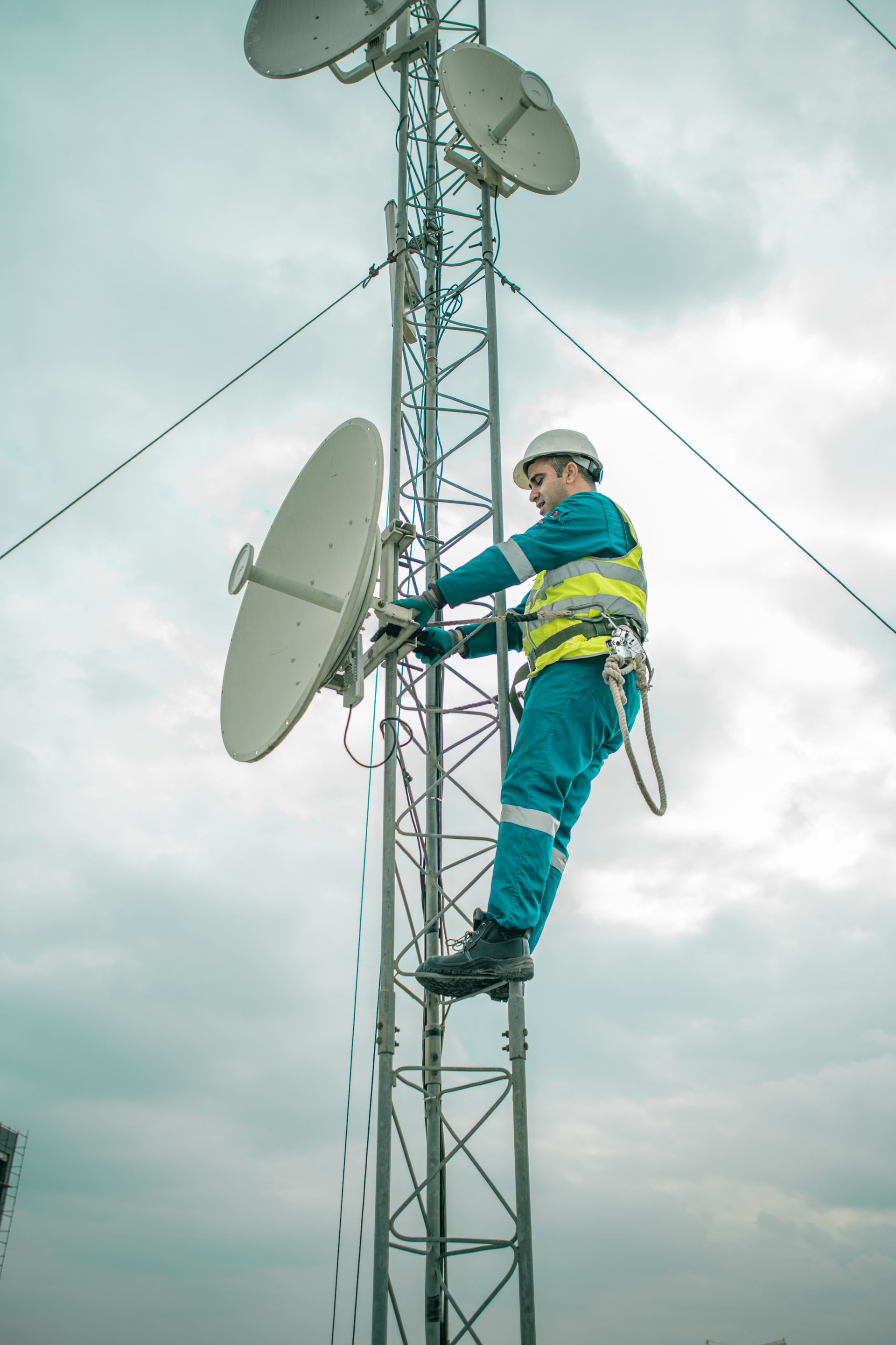 Certified contractor in safety gear on site, verified and granted access